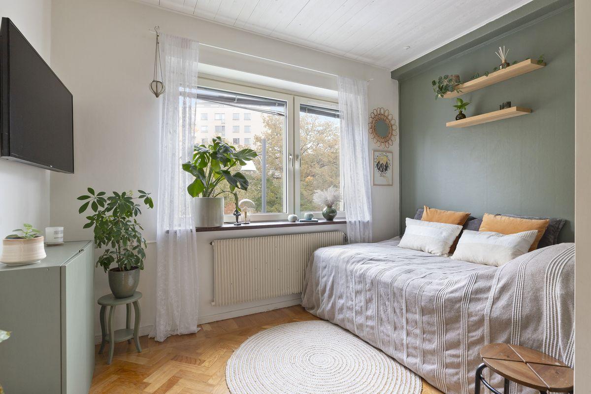 Grüne Wandfarbe Schlafzimmer Pflanzen
